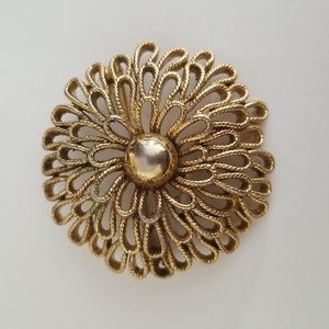 Vintage Trifari goldtone brooch.
